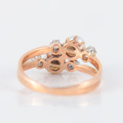 Double bague ancienne en or rose perles et diamants.