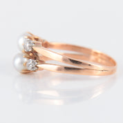 Double bague ancienne en or rose perles et diamants.