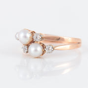 Double bague ancienne en or rose perles et diamants.