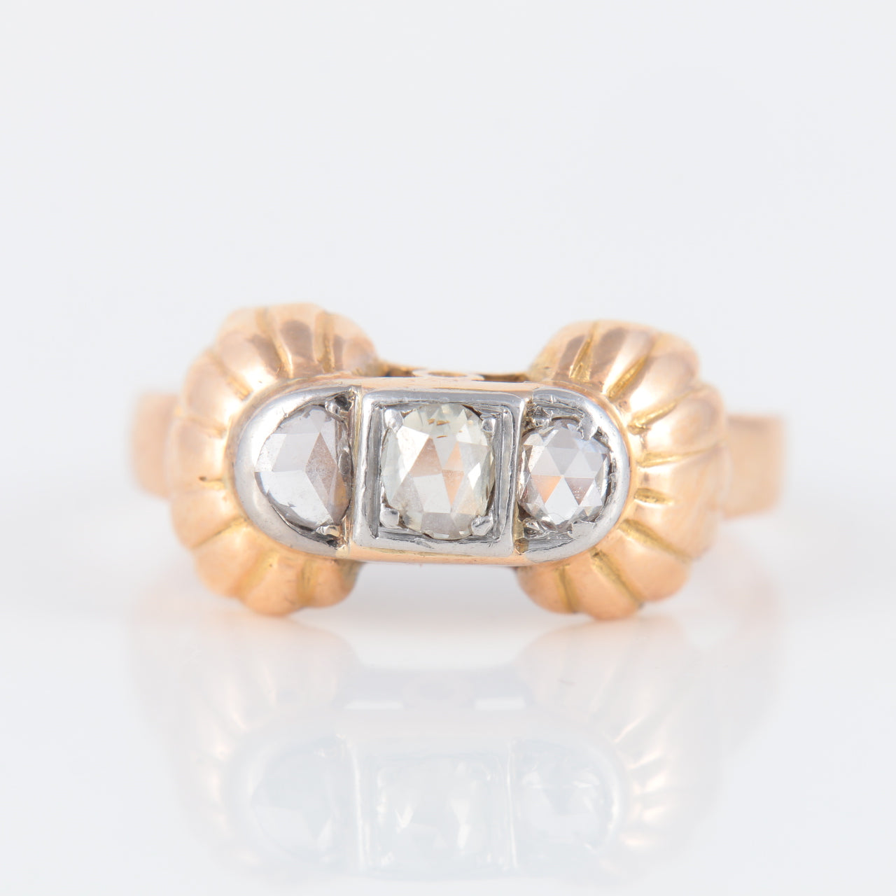 Bague or rose, platine et diamants