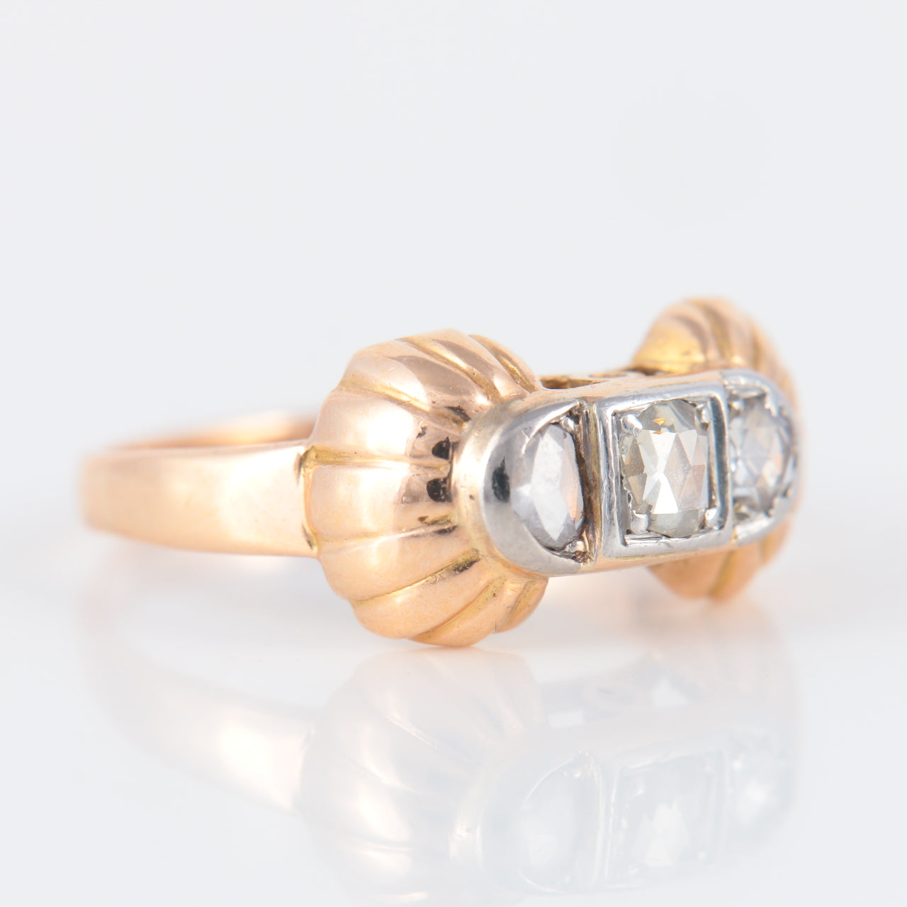 Bague or rose, platine et diamants