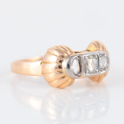 Bague or rose, platine et diamants