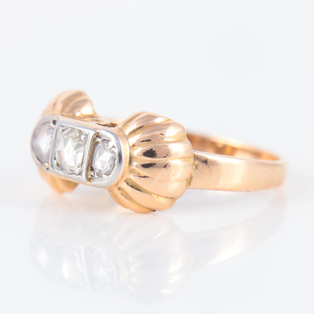 Bague or rose, platine et diamants