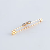 Broche or jaune, diamants et perle