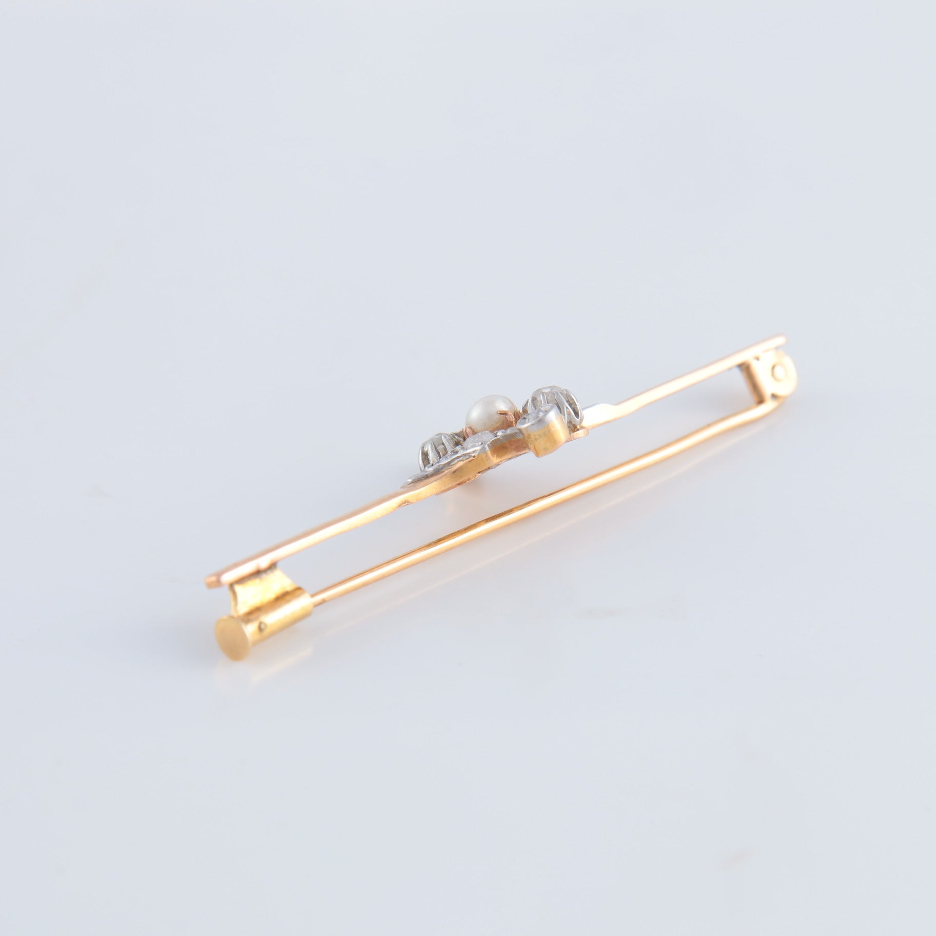 Broche or jaune, diamants et perle
