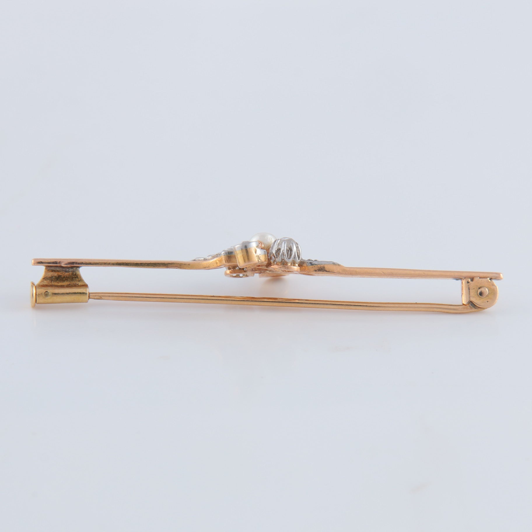 Broche or jaune, diamants et perle
