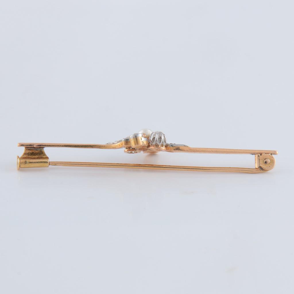Broche or jaune, diamants et perle
