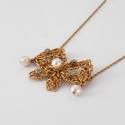 Collier Noeud en or perles, diamants et rubis